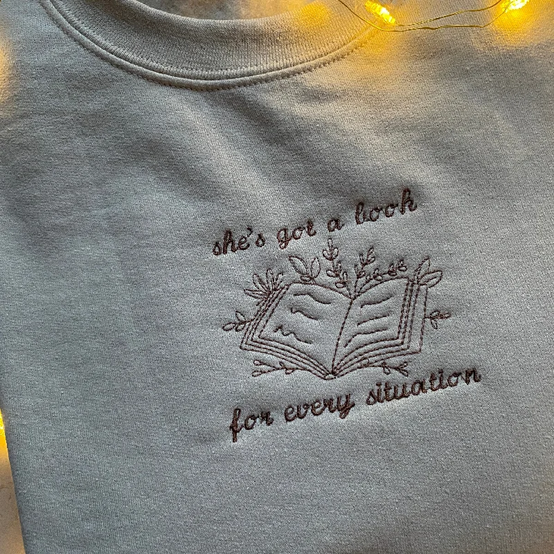 men's-hoodie-with-windproof-layer-A book for every situation Embroidered Sweatshirt